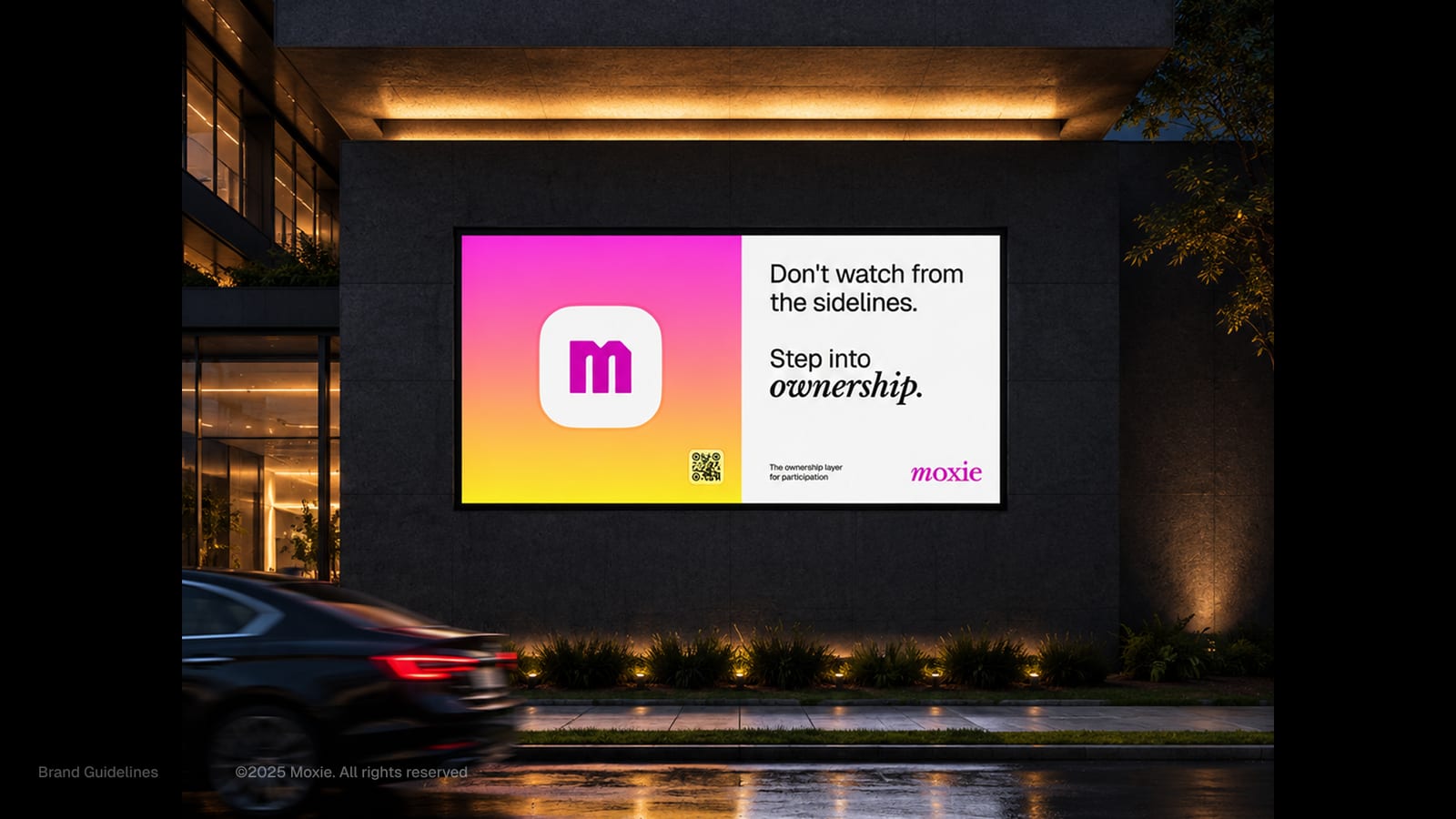 A night-time Moxie billboard: 'Don't watch from the sidelines. Step into ownership.'