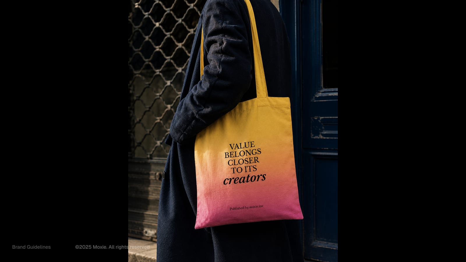 A Moxie tote bag reading 'value belongs closer to its creators'